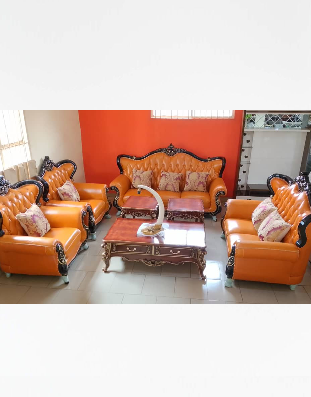 Royal Sofas 010 - Premium Royal Orange Leather Sofa Set with Glossy Wood Finish – J Charles Furniture Ltd